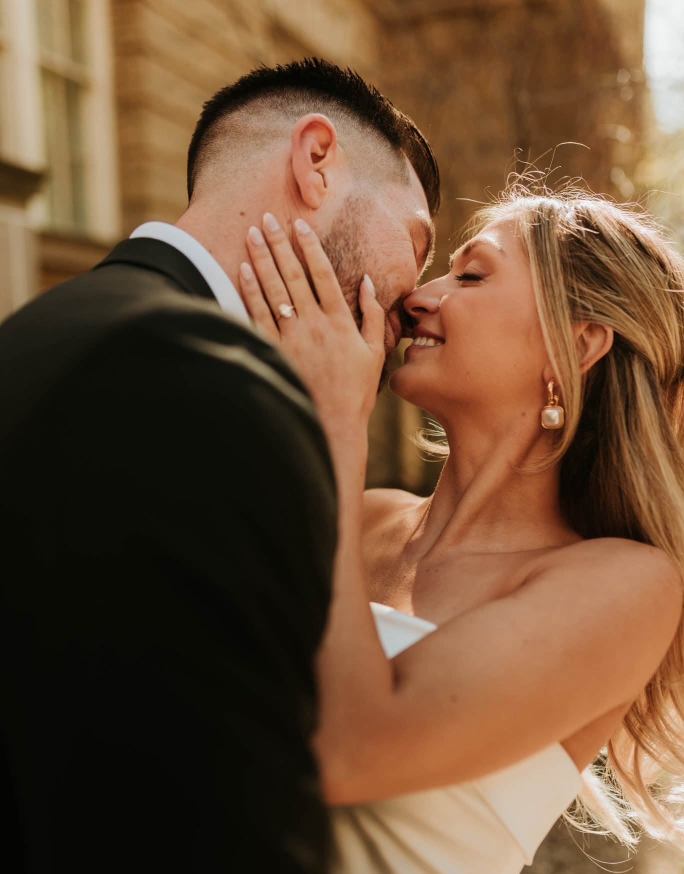 Couple enjoying vibrant colors in a city market during a Fatography pre wedding session.