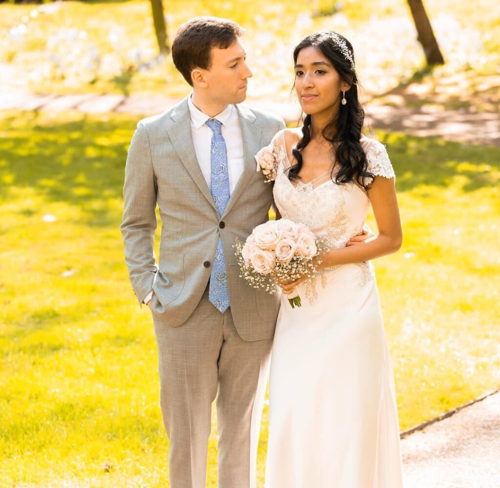 Groom standing confidently on the street during a Fatography pre wedding shoot.