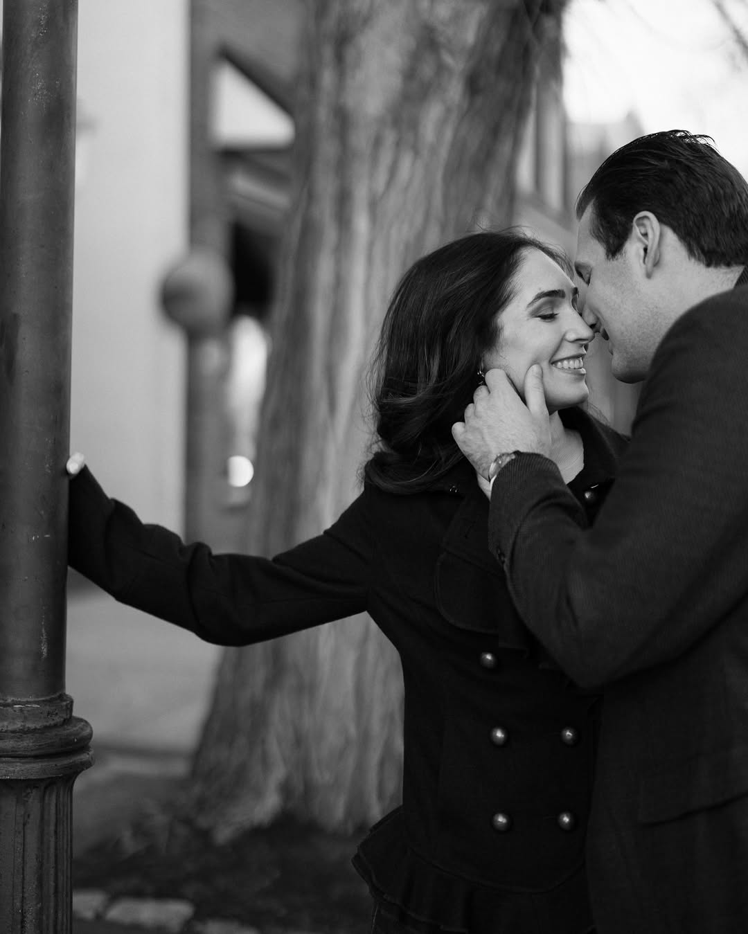 Couple sitting by the riverbank in a Fatography pre wedding photoshoot.