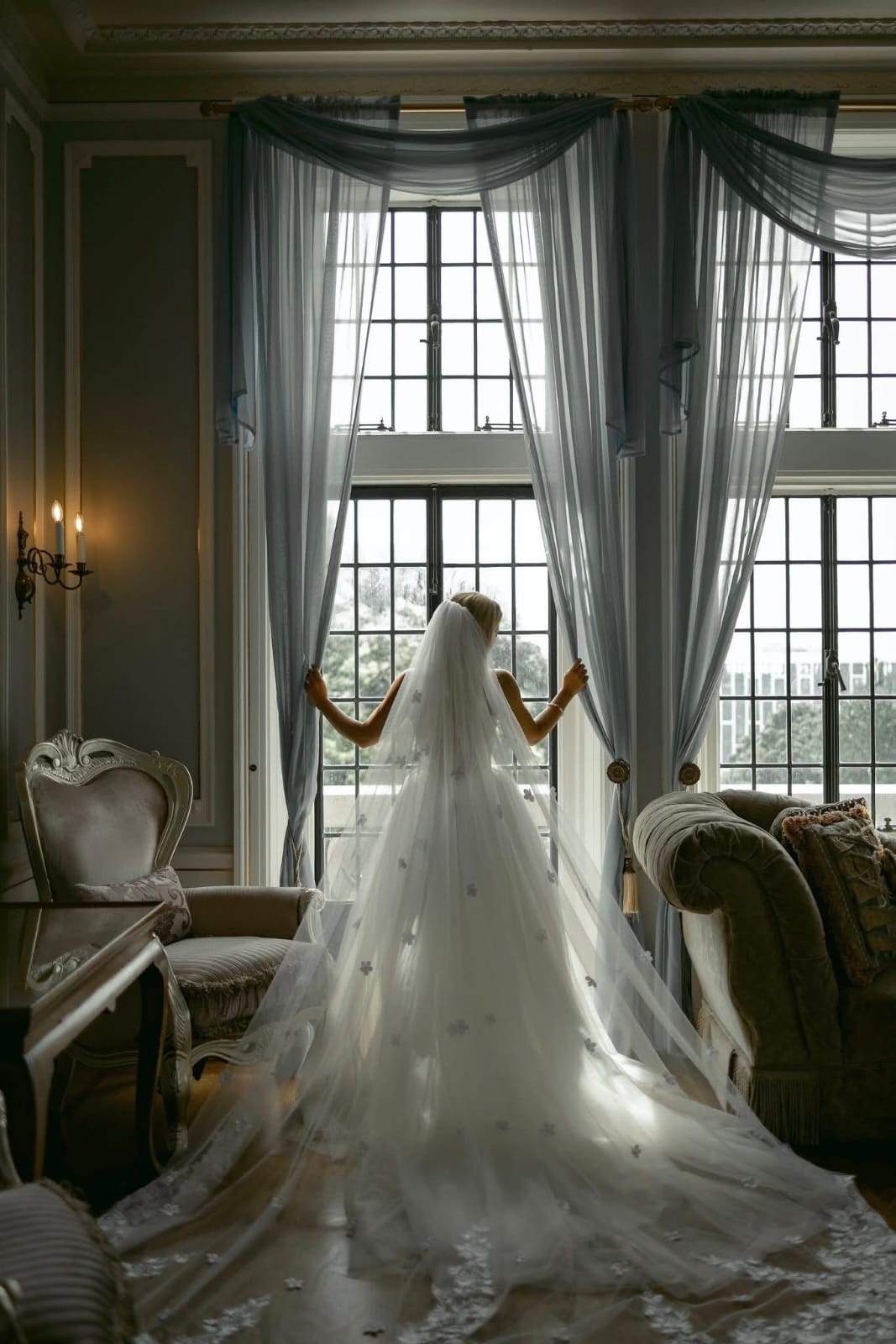 Couple enjoying a rooftop view of the city during a Fatography pre wedding session.