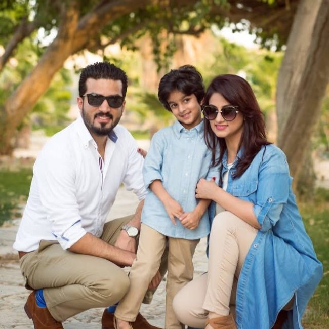 Couple sitting on steps during photoshoot