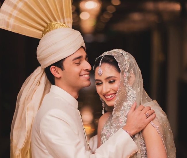Pre-wedding photography of couple in wide decorated marriage hall