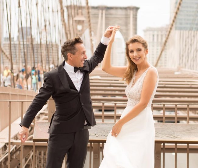 Candid shot of groom near a bridge in the city captured during Fatography pre wedding photography