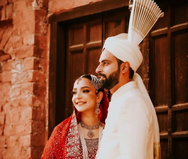 Pre-wedding couple pose with girl holding boy’s arm