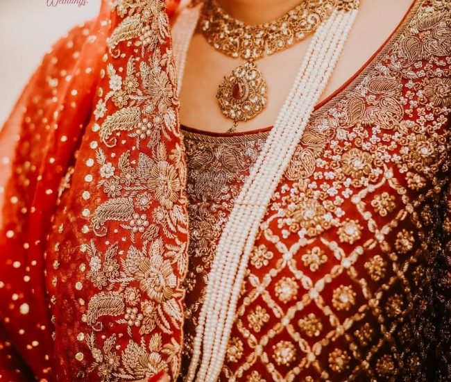 Couple walking hand in hand during pre-wedding shoot in village
