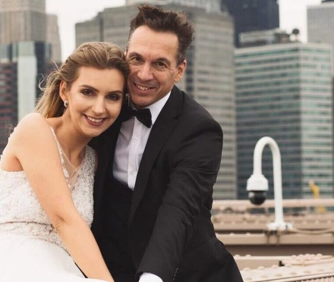 Close-up groom portrait near bridge railing during Fatography pre wedding photography.
