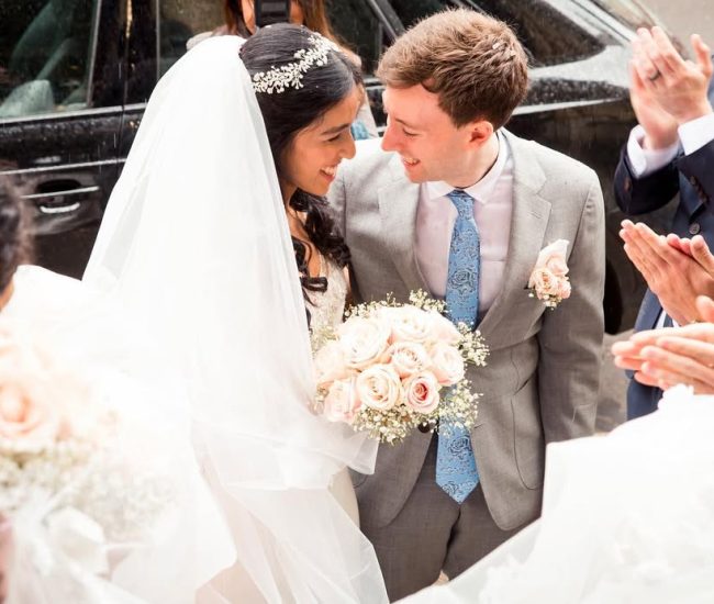 Groom posing in a modern street setting during Fatography pre wedding photography.