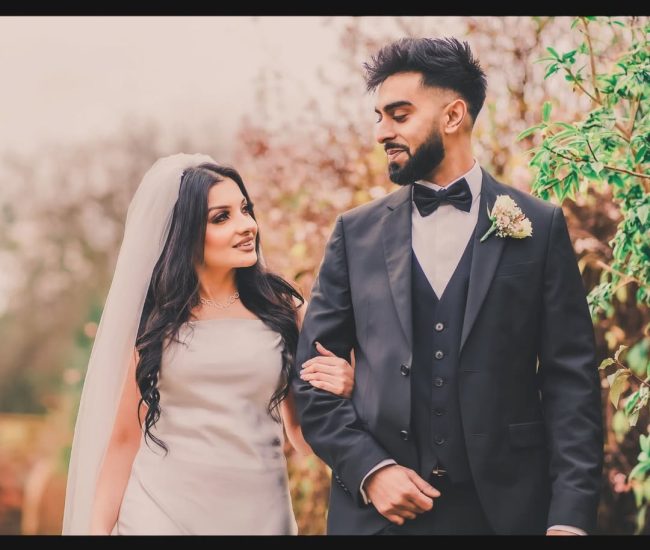 Groom looking lovingly at bride during outdoor pre-wedding shoot
