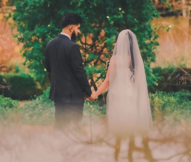 Beautiful bridal veil portrait in garden pre-wedding shoot