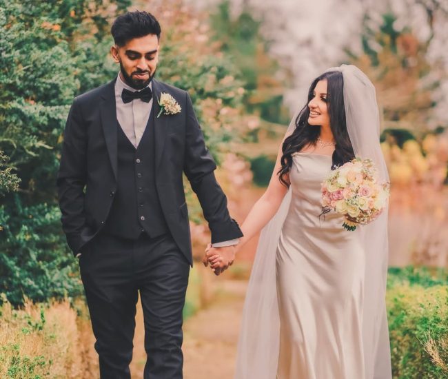 Vintage black and white pre-wedding couple photograph in garden