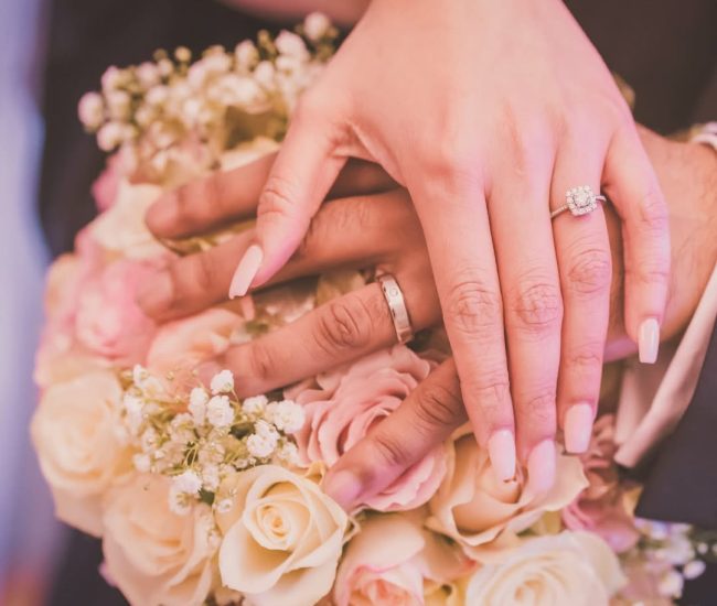 Bride holding wedding bouquet flowers in pre-wedding photoshoot