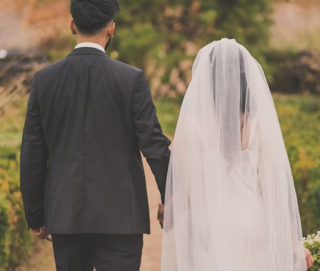 Pre-wedding couple stylish pose outdoors in garden