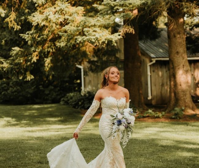 Couple standing on a small garden bridge in a Fatography pre wedding photoshoot.