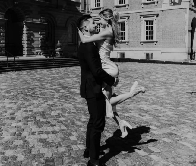 Romantic moment under city street lights during a Fatography pre wedding shoot.