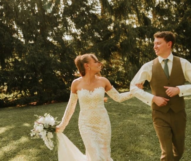 Couple walking on a garden pathway during a Fatography pre wedding photoshoot.