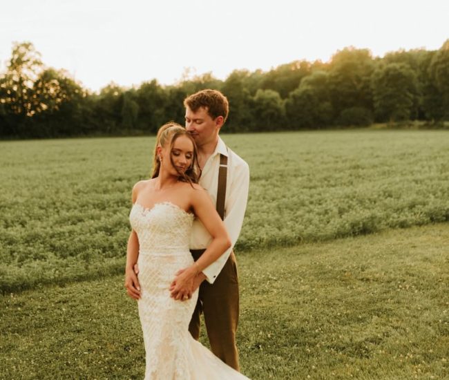 Natural candid laughter of bride and groom in a green garden during Fatography pre wedding photography