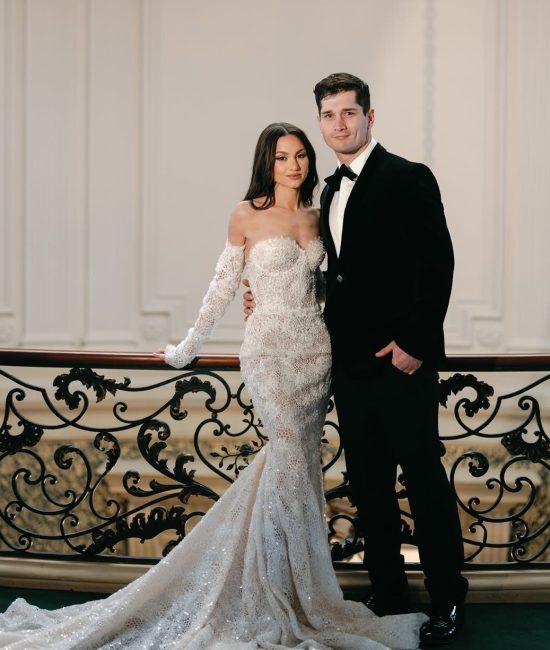 Formal indoor shoot of bride in white and groom in black during a Fatography pre wedding session