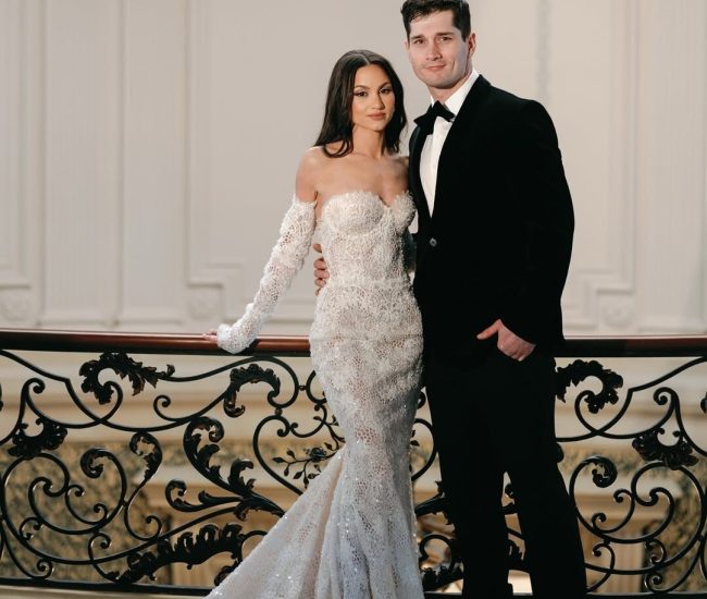 Formal indoor shoot of bride in white and groom in black during a Fatography pre wedding session