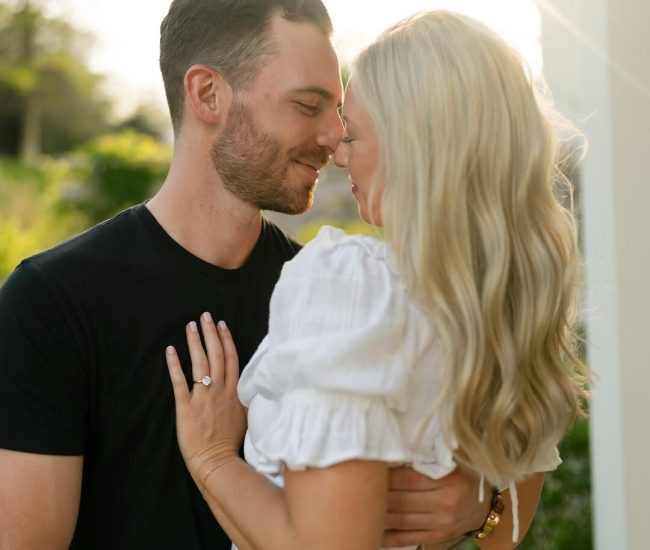 Romantic pre wedding moment captured in greenery by Fatography photography.