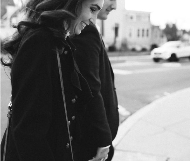 Couple sharing a romantic moment on the stairs in a Fatography pre wedding session.