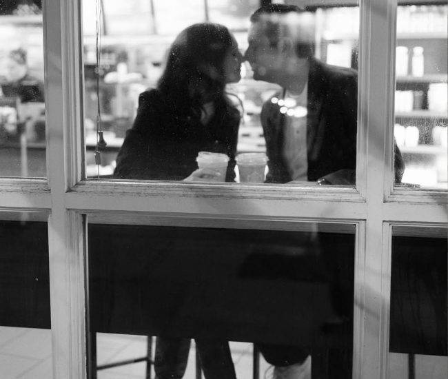 Couple walking down a pathway in a Fatography pre wedding shoot.