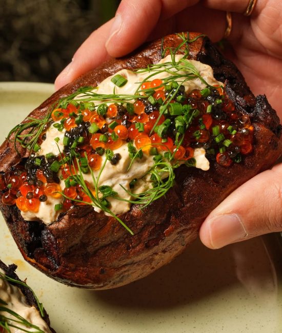 Chef garnishing salad – what is food photography in Dubai example