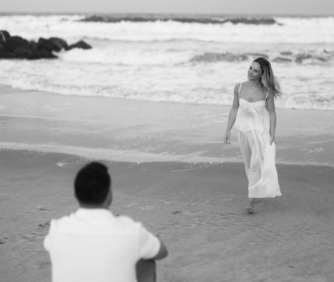Stylish couple posing with a car in a Fatography pre wedding session