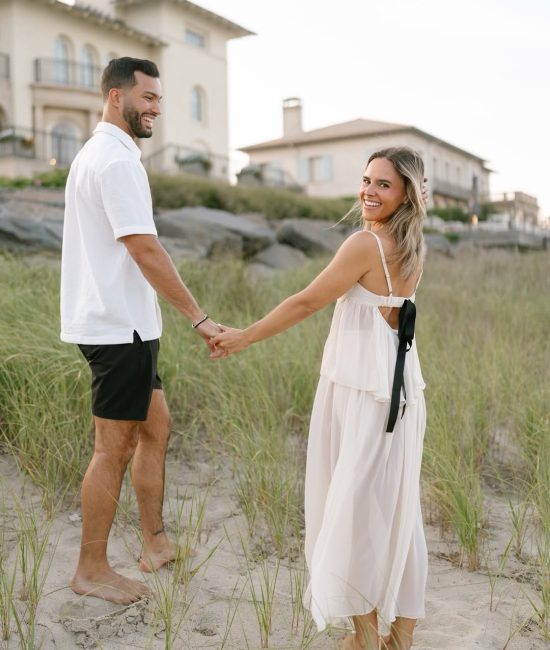 Couple posing in a forest location during a Fatography pre wedding shoot.