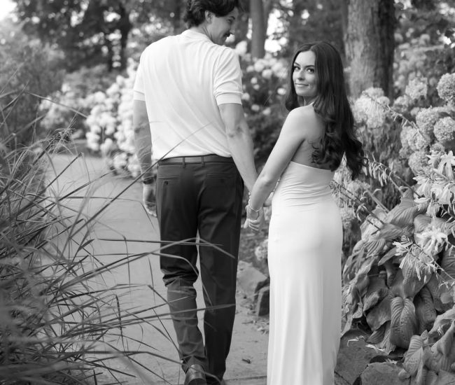 Couple posing in natural outdoor scenery during a Fatography pre wedding shoot.