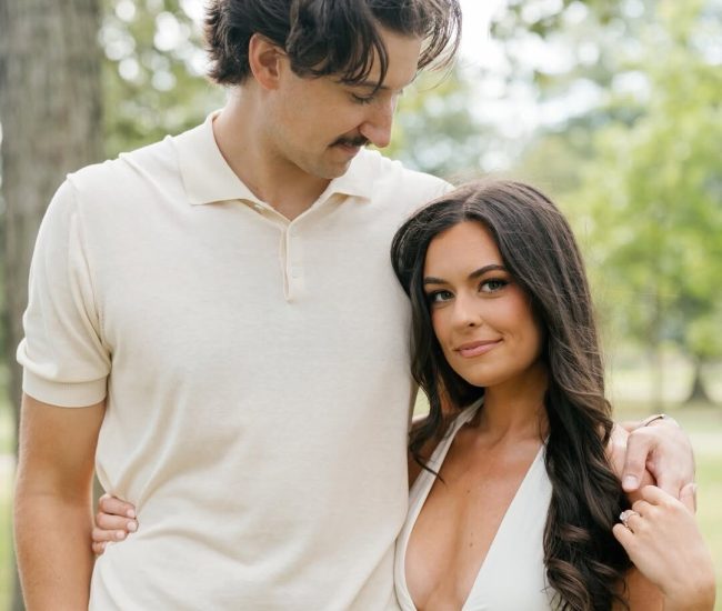 Couple sitting together for a romantic Fatography pre wedding photography session.
