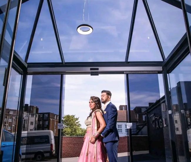 Romantic close-up pre-wedding portrait of couple indoors