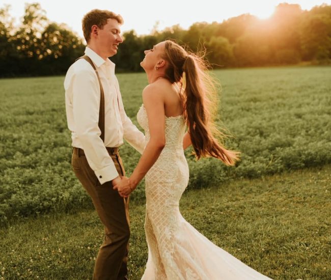 Bride and groom walking hand in hand through the garden in a Fatography pre wedding session